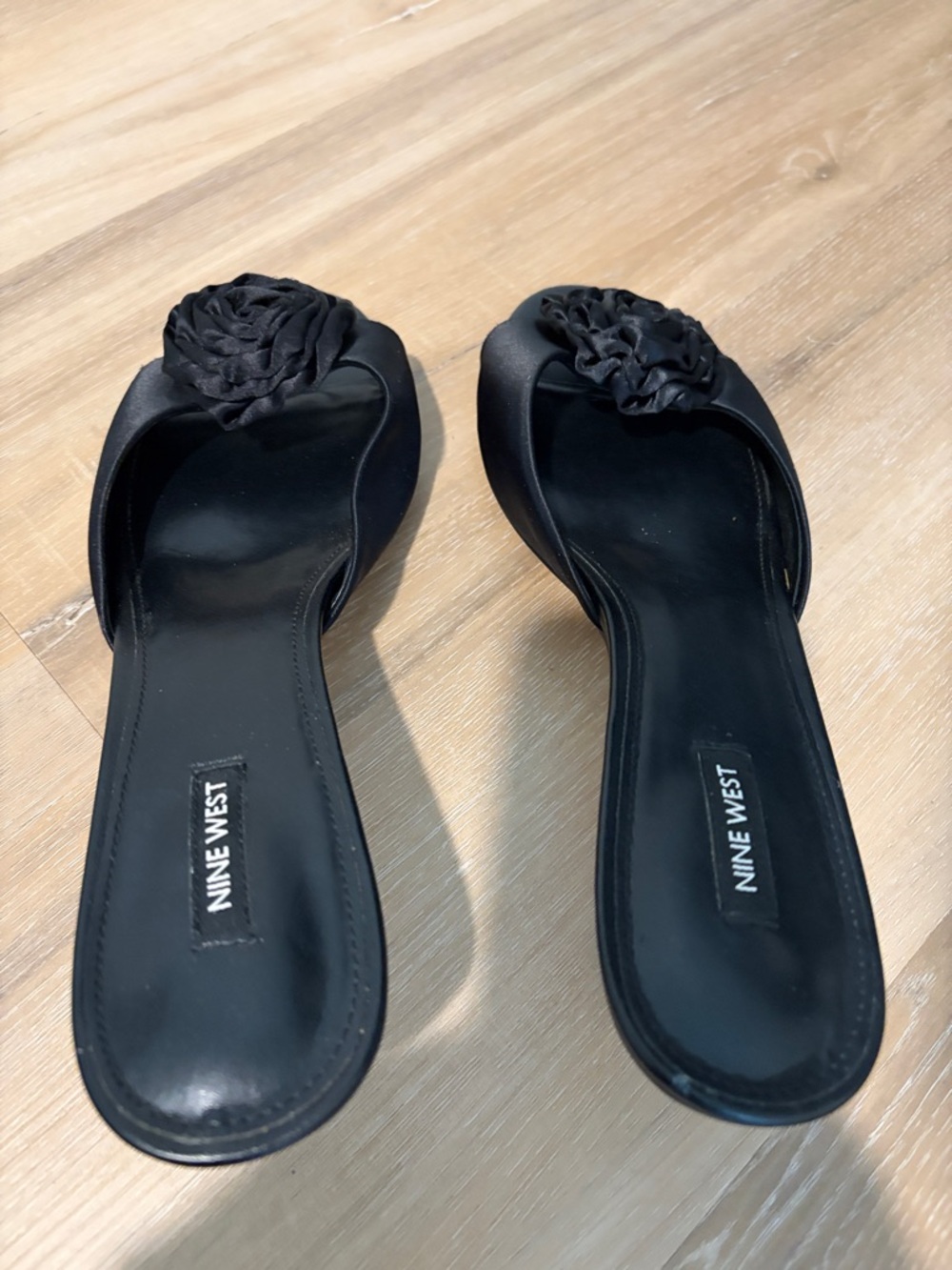 Nine West Black Slide Mules with Rosette Accent